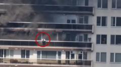 Watch: Moment man climbs balcony to escape Antwerp fire