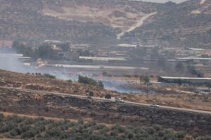 Two Palestinians shot dead by Israeli forces as West Bank fields set ablaze